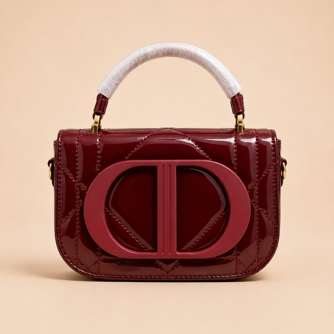 Burgundy Patent Quilted Glossy  Top Handle Bag with Statement Front Detail