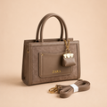 Elegant Taupe Structured Tote Handbag with Mini Charm & Crossbody Strap